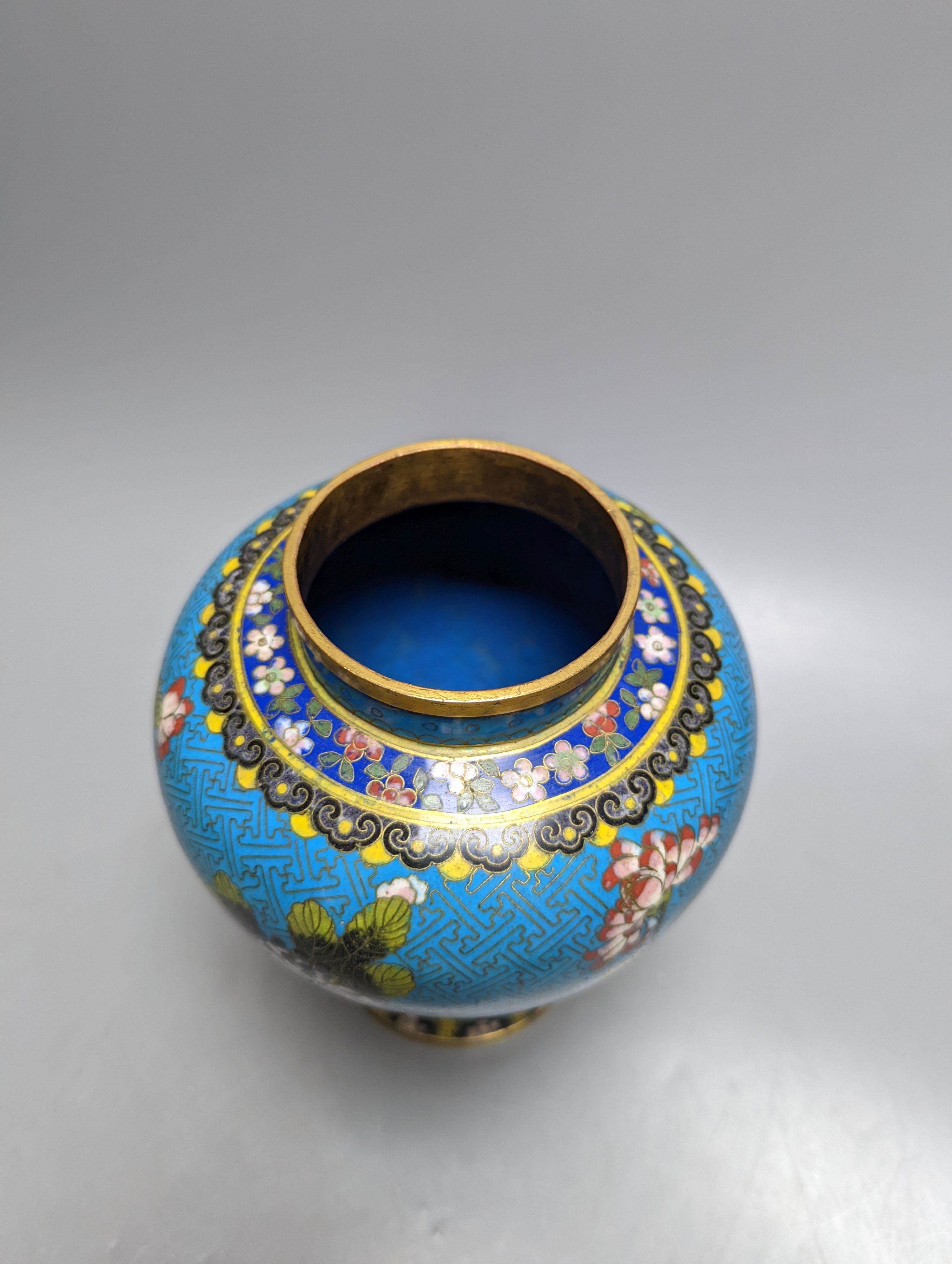 A Chinese cloisonne enamel vase and cover, early 20th century and a bronze brush pot 25cm